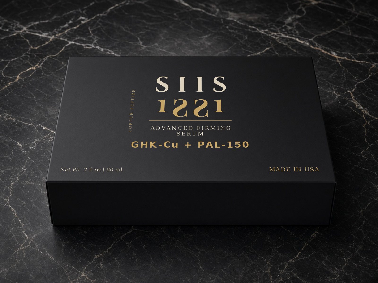 The SIIS black and gold serum box on marble
